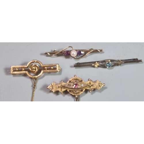 218 - Collection of Victorian/Edwardian brooches, one with diamond chips and ruby, 9ct and 14ct.  total we... 