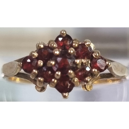 221 - 9ct gold garnet cluster dress ring.  2g approx.  Size L1/2.  (B.P. 21% + VAT)