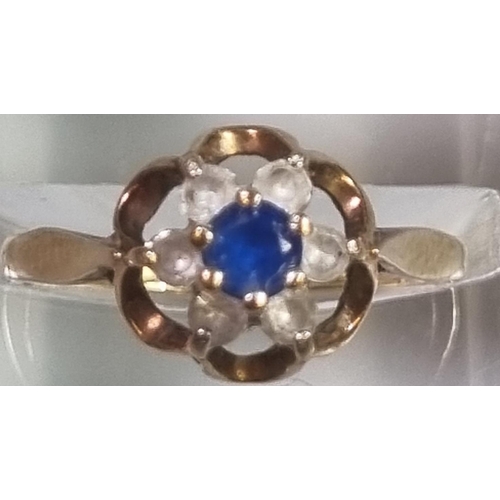 224 - 9ct gold clear and blue stone flowerhead dress ring.  1.6g approx.  Size J1/2.  (B.P. 21% + VAT)