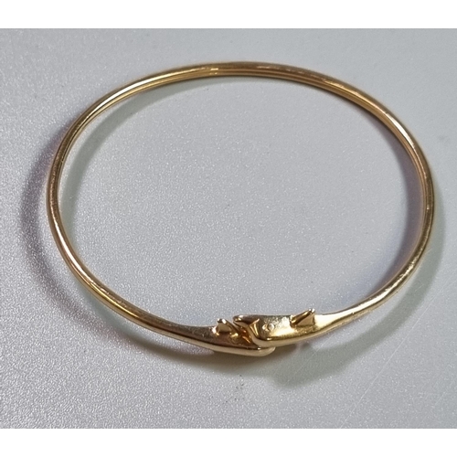 226 - 14ct gold Dolphin bangle/bracelet.  6g approx.  (B.P. 21% + VAT)