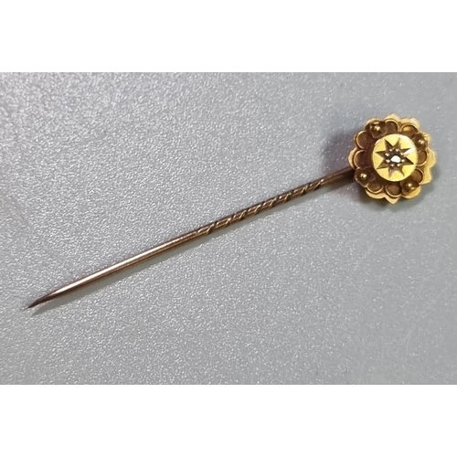 230 - Victorian 15ct gold stock pin with small central diamond chip.  1.4g approx.  In original Moroccan l... 