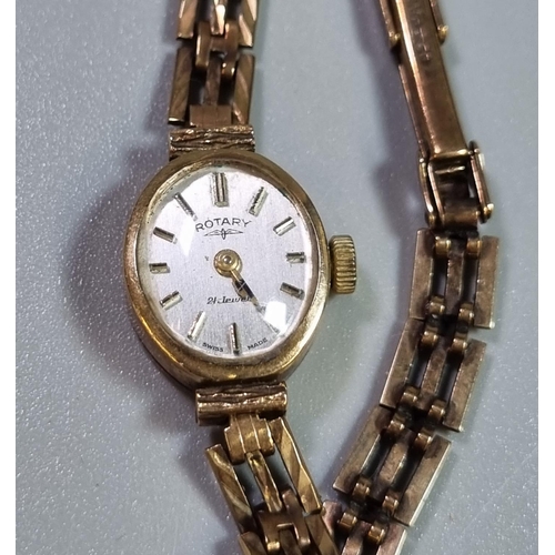 252 - 9ct gold ladies oval head, mechanical dress wristwatch with 9ct gold bright cut bracelet.  12.2g app... 