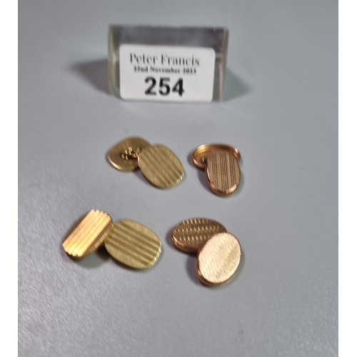 254 - Two pairs of gold cufflinks, one pair marked 9ct, one pair un-marked.  20g approx.   (B.P. 21% + VAT...