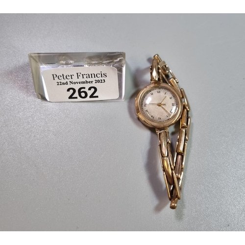 262 - 9ct gold ladies mechanical wristwatch with Roman face and expanding 9ct gold bracelet.  13g approx. ... 