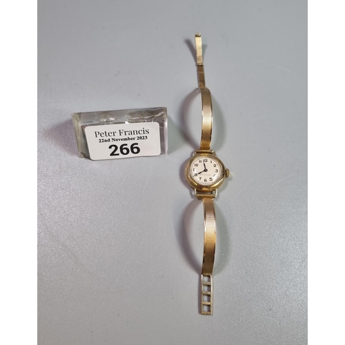 266 - 9ct gold ladies mechanical wristwatch with 9ct gold engine turned bracelet.  Overall weight 14.5g ap... 