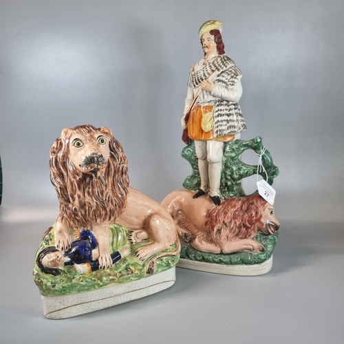 27 - 19th century Staffordshire Pottery study of a lion with dead man, together with a large Staffordshir... 