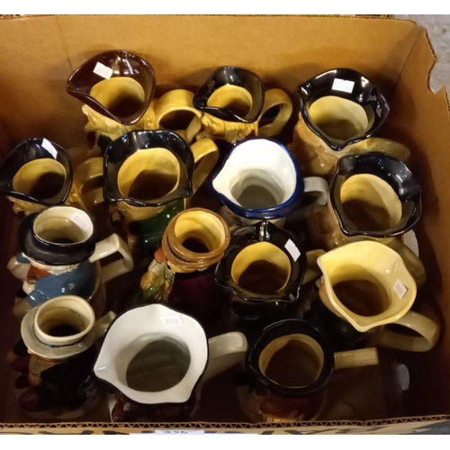 356 - Collection of assorted modern pottery zoomorphic teapots and biscuit barrels, together with a box of... 