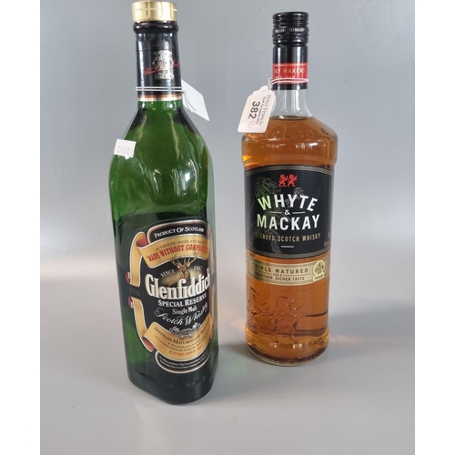 382 - Bottle of Whyte and MacKay blended Scotch Whisky.  1L.  40% vol. together with a bottle of Glenfiddi... 