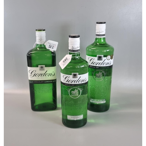 385 - Three bottles of Gordon's Special Dry London Gin, one marked 'The Original'.  2 x 1L.  37.5% vol.  t... 