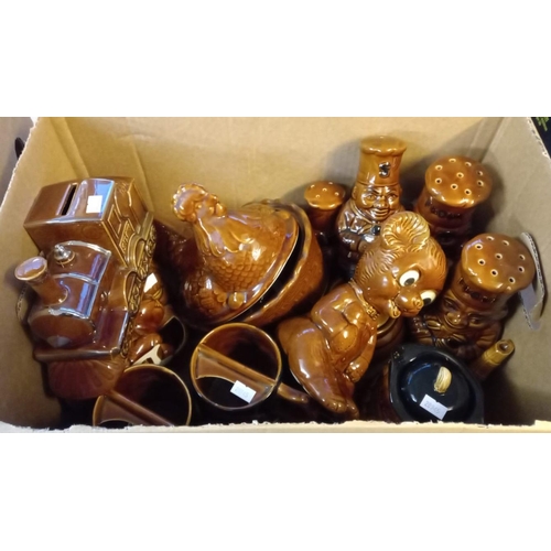 395 - Four boxes of assorted modern pottery zoomorphic biscuit barrels, animal figures, condiments, moneyb... 