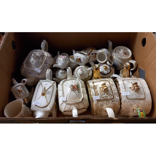 401 - Collection of assorted gilded pottery and porcelain tea ware items, some miniatures together with a ... 