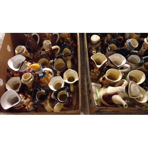 411 - Three boxes of assorted modern novelty teapots, character jugs etc.  (3)  (B.P. 21% + VAT)