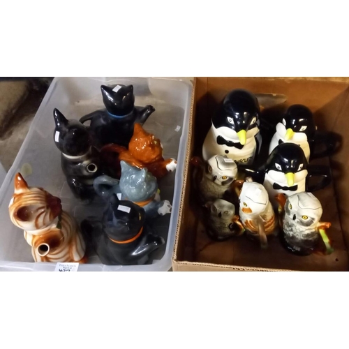 427 - Three boxes of novelty zoomorphic teapots in the form of: penguins, owls, cats and jars in the form ... 