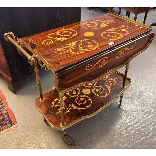 442 - Modern novelty rosewood finish and gilded drinks trolley on wheels.    (B.P. 21% + VAT)