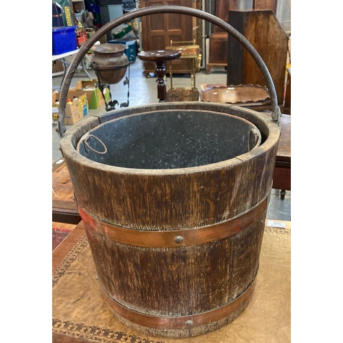 491 - Victorian Oak coopered bucket/barrel with copper banding and swing handle with original metal interi... 