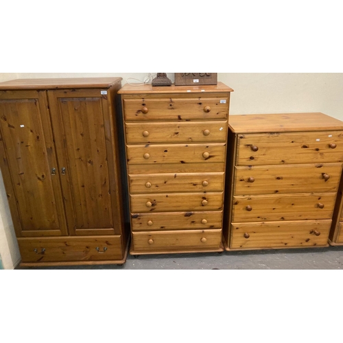 501 - Collection of modern pine furnishing items to include, two door wardrobe, various chests of drawers,... 