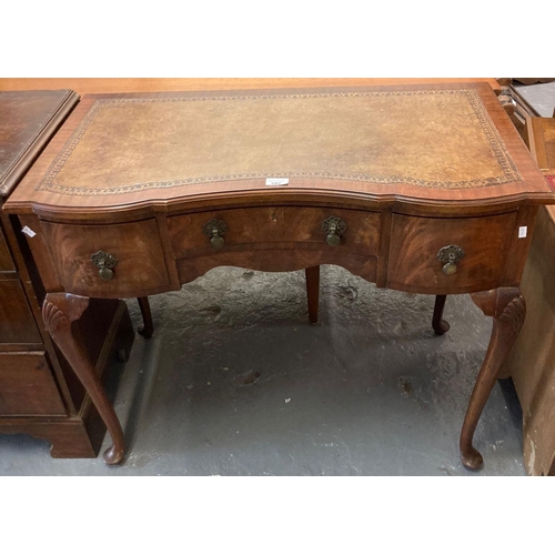 502 - Early 20th century walnut serpentine design writing desk on cabriole legs and pad feet.  (B.P. 21% +... 