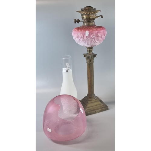 51 - Early 20th century double oil burner lamp having cranberry etched shade above a pink opaline glass m... 