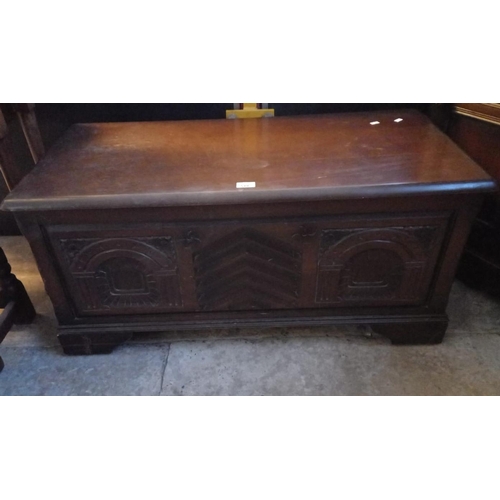 518 - Modern oak coffer/blanket chest in 17th century style with carved decoration.  (B.P. 21% + VAT)