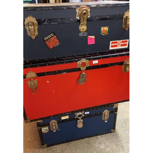 523 - Three large travelling trunks.  (3)  (B.P. 21% + VAT)