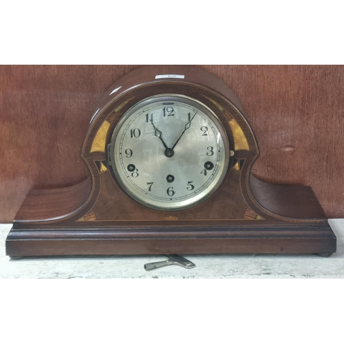 65 - Edwardian inlaid mahogany three train arched mantle clock with silvered Arabic face.  25cm high appr... 