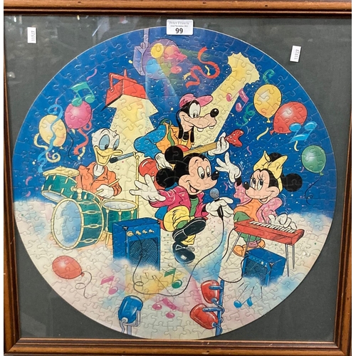 99 - Framed circular Mickey Mouse Band jigsaw.  51cm diameter approx.   (B.P. 21% + VAT)