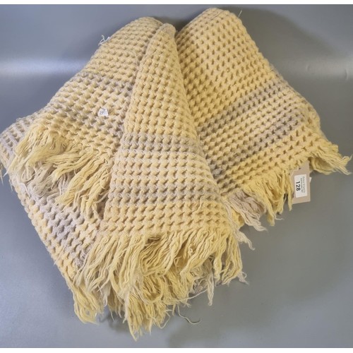 128 - Vintage woollen yellow ground check honeycomb blanket/carthen with fringed edges.  (B.P. 21% + VAT)