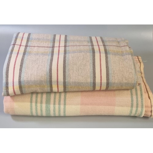 127 - Four vintage woolen blankets/carthen, three check design in various colourways and one striped narro... 