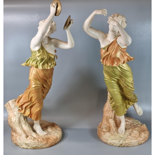 146 - Royal Worcester blush ivory figure, modelled by James Hadley, emblematic of music and joy on natural... 