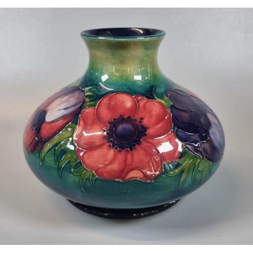 149 - Mid century Moorcroft Pottery tube lined 'Anemone' globular squat vase. 13cm high approx. Signed to ... 