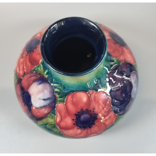 149 - Mid century Moorcroft Pottery tube lined 'Anemone' globular squat vase. 13cm high approx. Signed to ... 