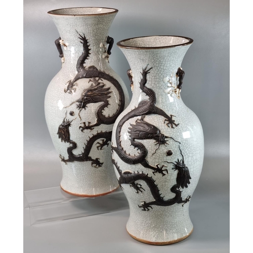 170 - Mirror matched pair of Chinese porcelain baluster vases, depicting two writhing brown coloured five ... 