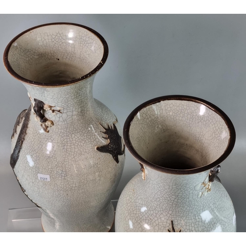 170 - Mirror matched pair of Chinese porcelain baluster vases, depicting two writhing brown coloured five ... 