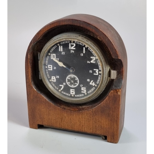 191 - WWII period German aircraft clock, now set in a wooden mantle case, opening to reveal script 'Heeres... 