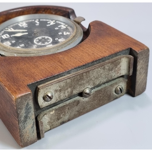 191 - WWII period German aircraft clock, now set in a wooden mantle case, opening to reveal script 'Heeres... 