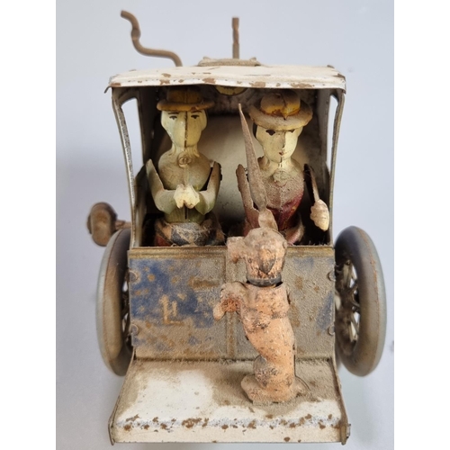 197 - Lehmann's tinplate clockwork Hansom Cab with two passengers and dog, the driver seated above a third... 