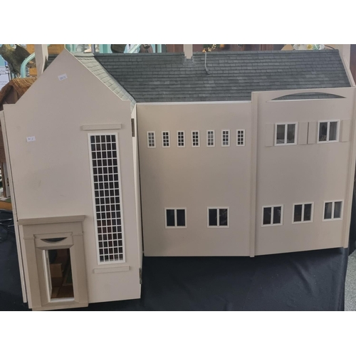 197C - Large well made collector's dolls house, taking the form of an Art Deco Charles Rennie Mackintosh de... 