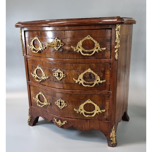 211 - 19th century continental walnut serpentine front three draw apprentice chest with gilt metal mounts,... 