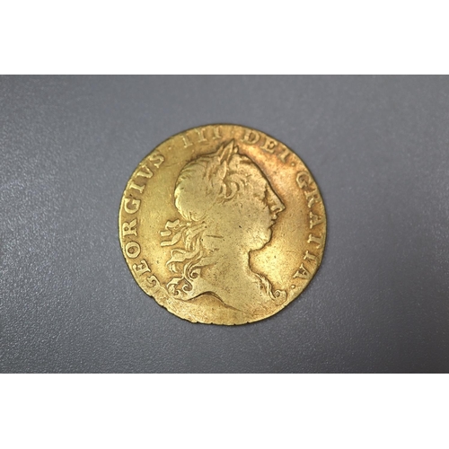 306 - George III gold Guinea dated 1763.  8.3g approx.   (B.P. 21% + VAT)