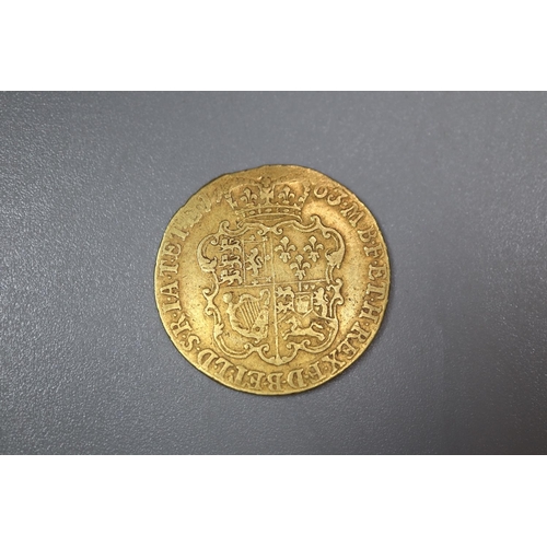 306 - George III gold Guinea dated 1763.  8.3g approx.   (B.P. 21% + VAT)