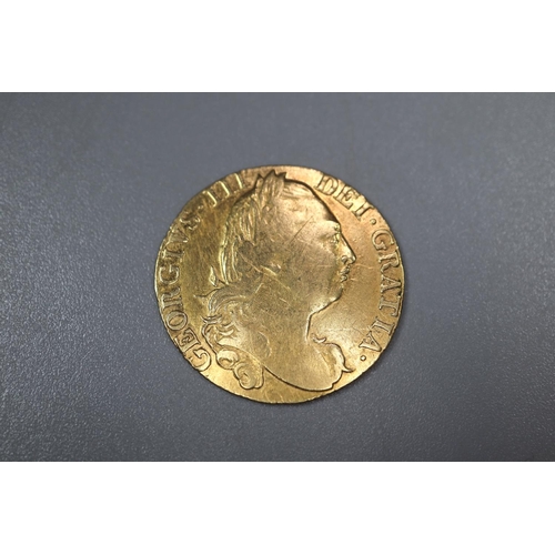 308 - George III 1776 gold Guinea.  8.4g approx.   (B.P. 21% + VAT)