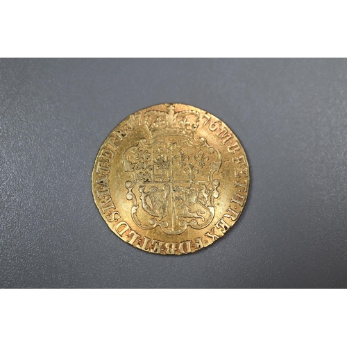 308 - George III 1776 gold Guinea.  8.4g approx.   (B.P. 21% + VAT)