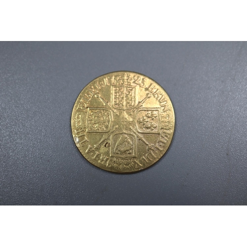 311 - George I 1723 gold Guinea.  8.3 approx.   (B.P. 21% + VAT)