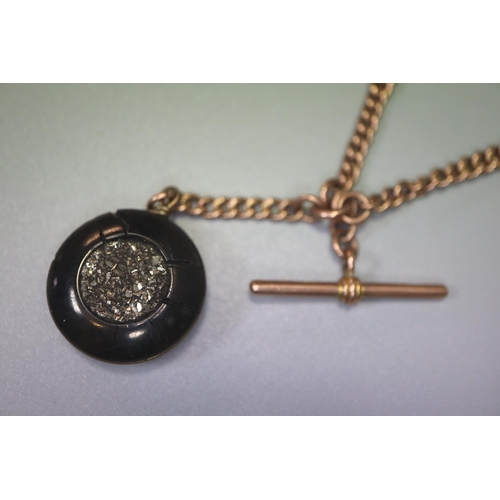 315 - 9ct gold T bar pocket watch chain with pendant stone.  Total weight 30g approx.   (B.P. 21% + VAT)