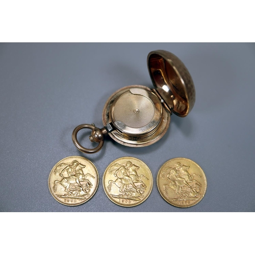 317 - Gold plated Dennison Sovereign holder comprising one Victorian sovereign dated 1893 and two George V... 