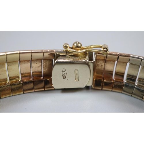 320 - 18ct gold ladies bracelet/bangle with varying gold tones marked 750.  1.2cm width approx.  27.3g app... 