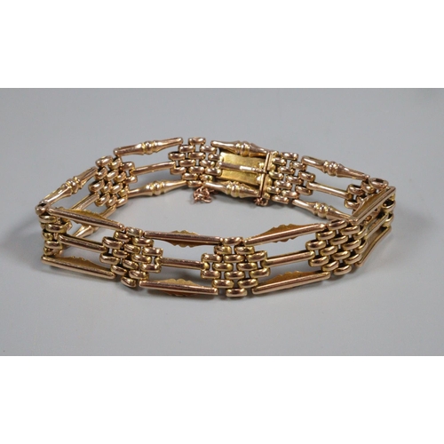 323 - 15ct gold three bar gate bracelet.  Marked 15c.  18cm long approx. 1.1cm wide approx.  23.3g approx.... 