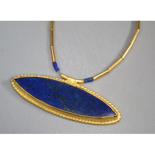 331 - 24K gold bamboo link chain with lapis lazuli pendant marked to the reverse 'Kurtinal 985K hand made ... 