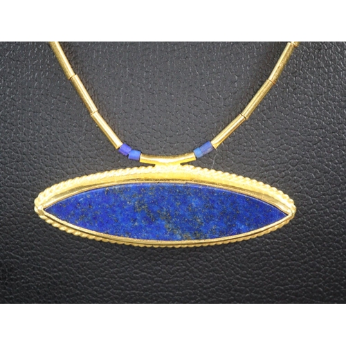 331 - 24K gold bamboo link chain with lapis lazuli pendant marked to the reverse 'Kurtinal 985K hand made ... 