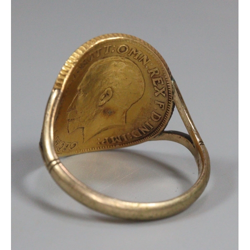 334 - George V shaped gold sovereign dated 1912 fixed to a 9ct gold ring mount.  9.6g approx.  (B.P. 21% +... 